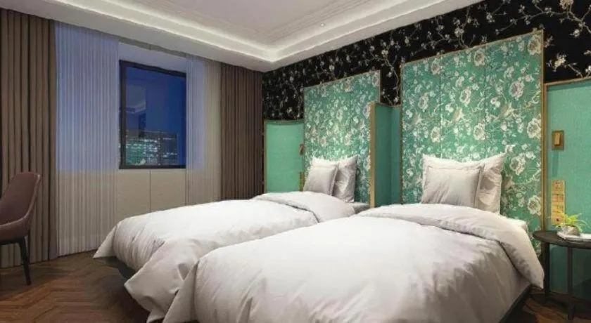 Bed in Metropolo Hotel Shijiazhuang Yuhua Wanda Plaza