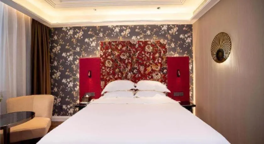 Bed in Metropolo Hotel Shijiazhuang Yuhua Wanda Plaza
