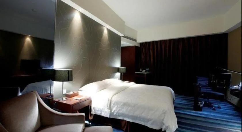 Bed in Metropolo Hotel Shijiazhuang Yuhua Wanda Plaza