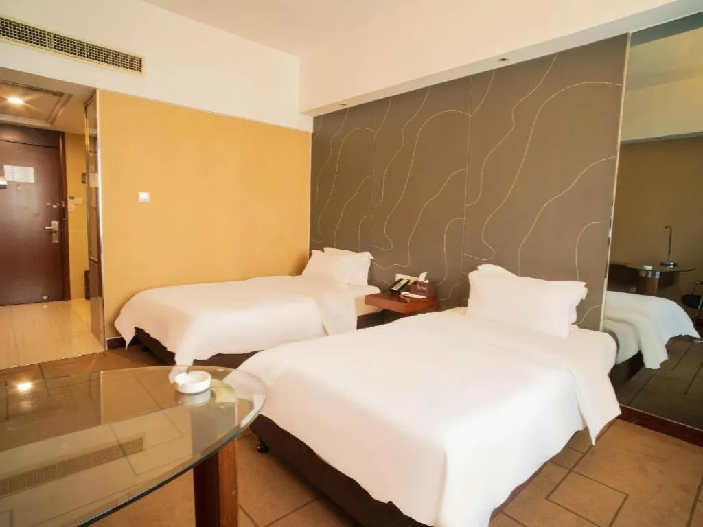 Bed in Metropolo Hotel Shijiazhuang Yuhua Wanda Plaza