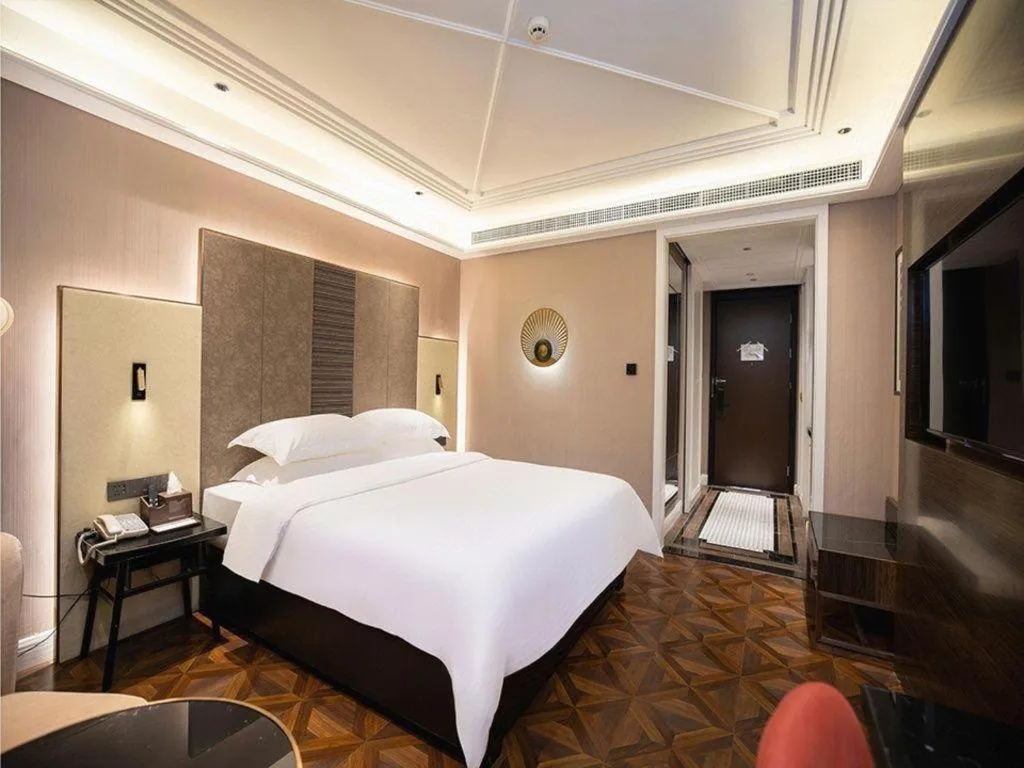 Bed in Metropolo Hotel Shijiazhuang Yuhua Wanda Plaza