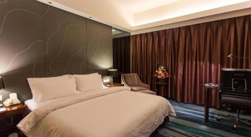 Bed in Metropolo Hotel Shijiazhuang Yuhua Wanda Plaza