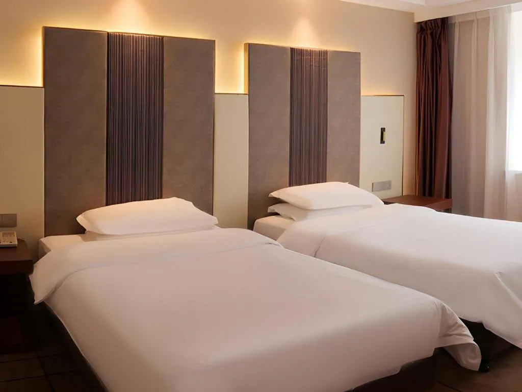 Bed in Metropolo Hotel Shijiazhuang Yuhua Wanda Plaza