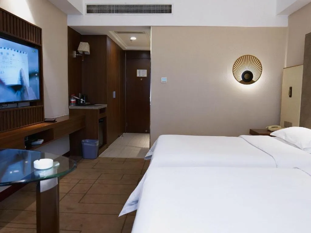 Bed in Metropolo Hotel Shijiazhuang Yuhua Wanda Plaza