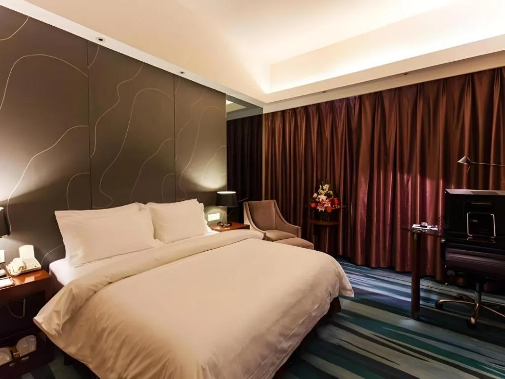 Bed in Metropolo Hotel Shijiazhuang Yuhua Wanda Plaza