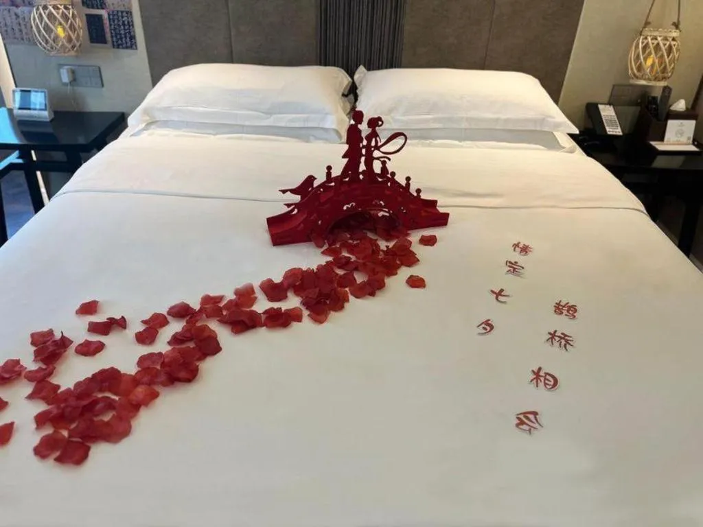 Bed in Metropolo Hotel Shijiazhuang Yuhua Wanda Plaza