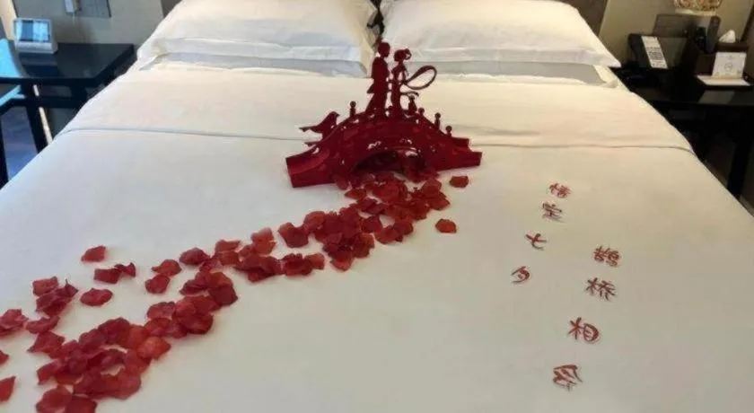 Bed in Metropolo Hotel Shijiazhuang Yuhua Wanda Plaza