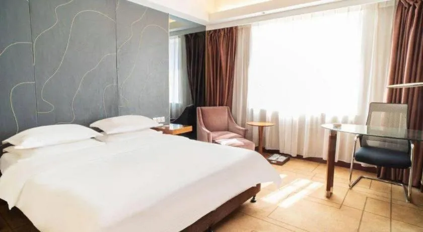 Bed in Metropolo Hotel Shijiazhuang Yuhua Wanda Plaza