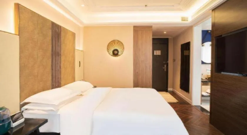 Bed in Metropolo Hotel Shijiazhuang Yuhua Wanda Plaza