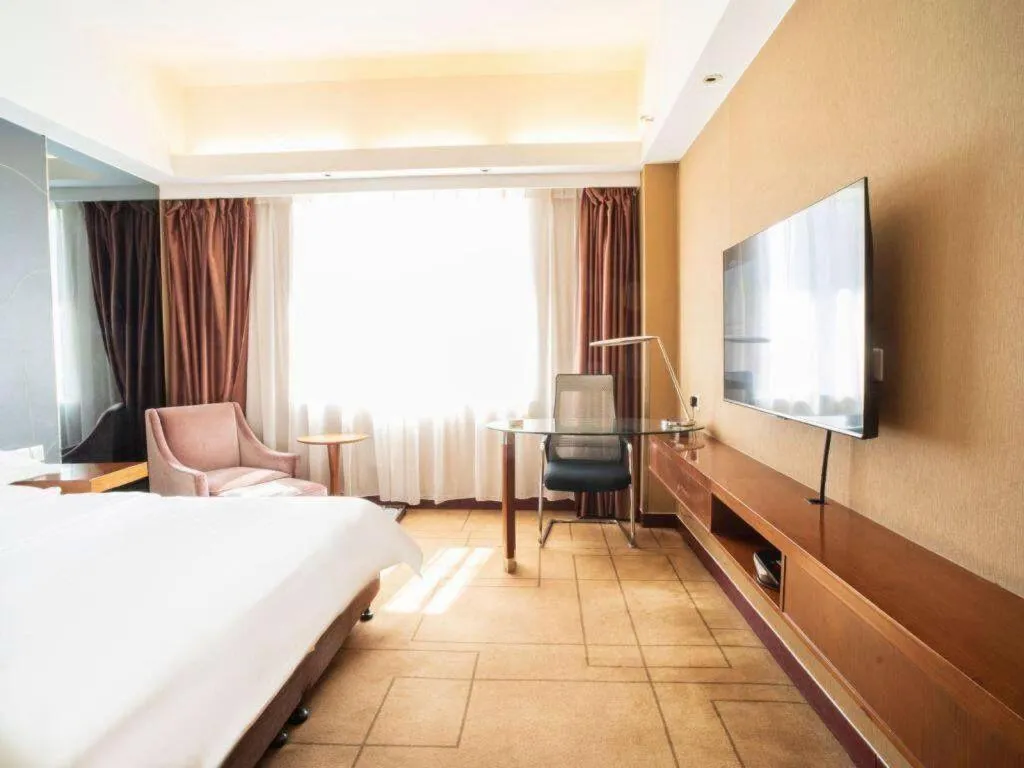 Bed in Metropolo Hotel Shijiazhuang Yuhua Wanda Plaza