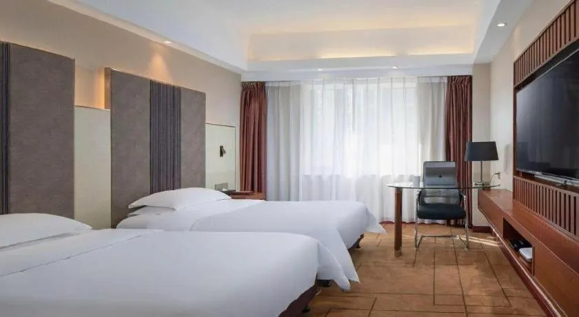 Bed in Metropolo Hotel Shijiazhuang Yuhua Wanda Plaza