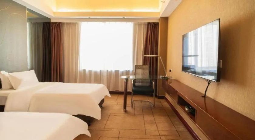 Bed in Metropolo Hotel Shijiazhuang Yuhua Wanda Plaza