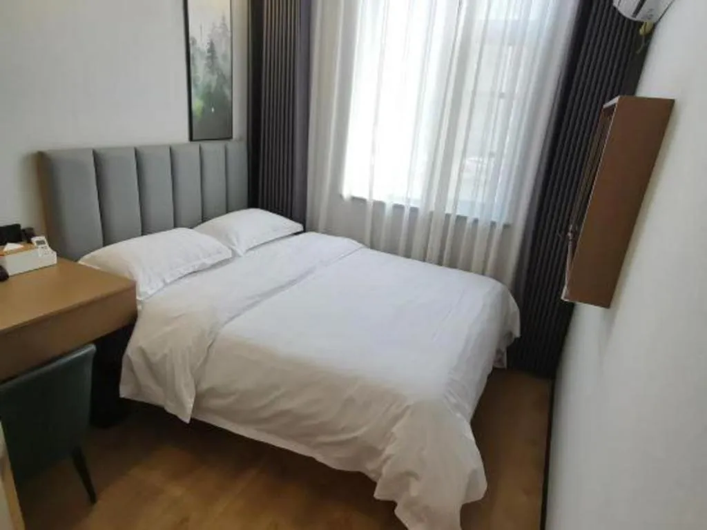 Bed in GreenTree Inn Jiangsu Xuzhou Western 3rd Ring Road Xiyuan Express Hotel