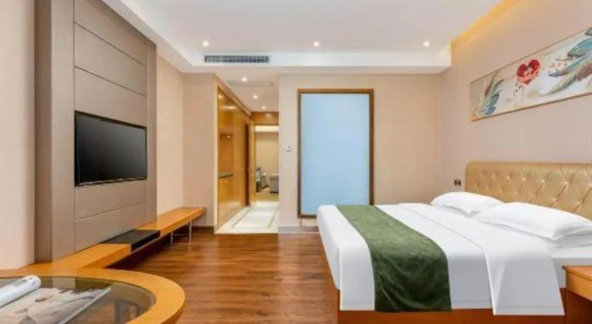 Bed in GreenTree Inn Shandong Taian Feicheng Xincheng Road Business Hotel