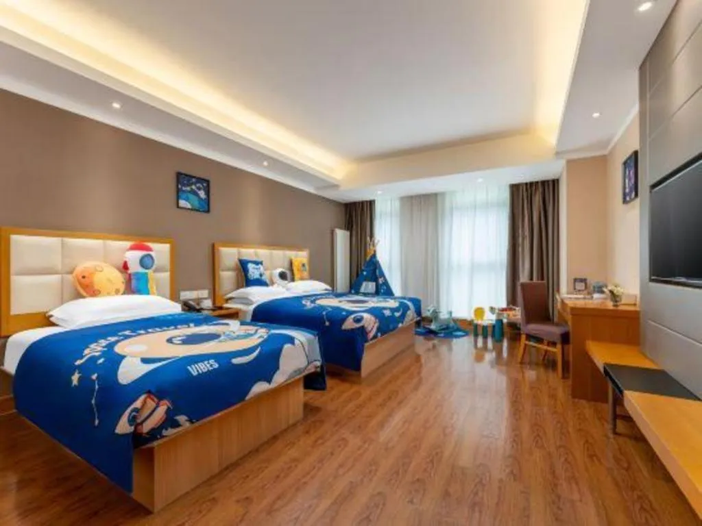 Bed in GreenTree Inn Shandong Taian Feicheng Xincheng Road Business Hotel