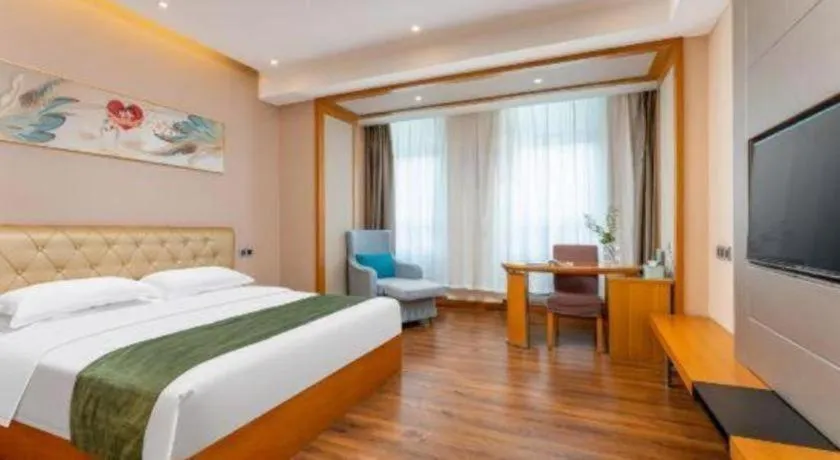 Bed in GreenTree Inn Shandong Taian Feicheng Xincheng Road Business Hotel