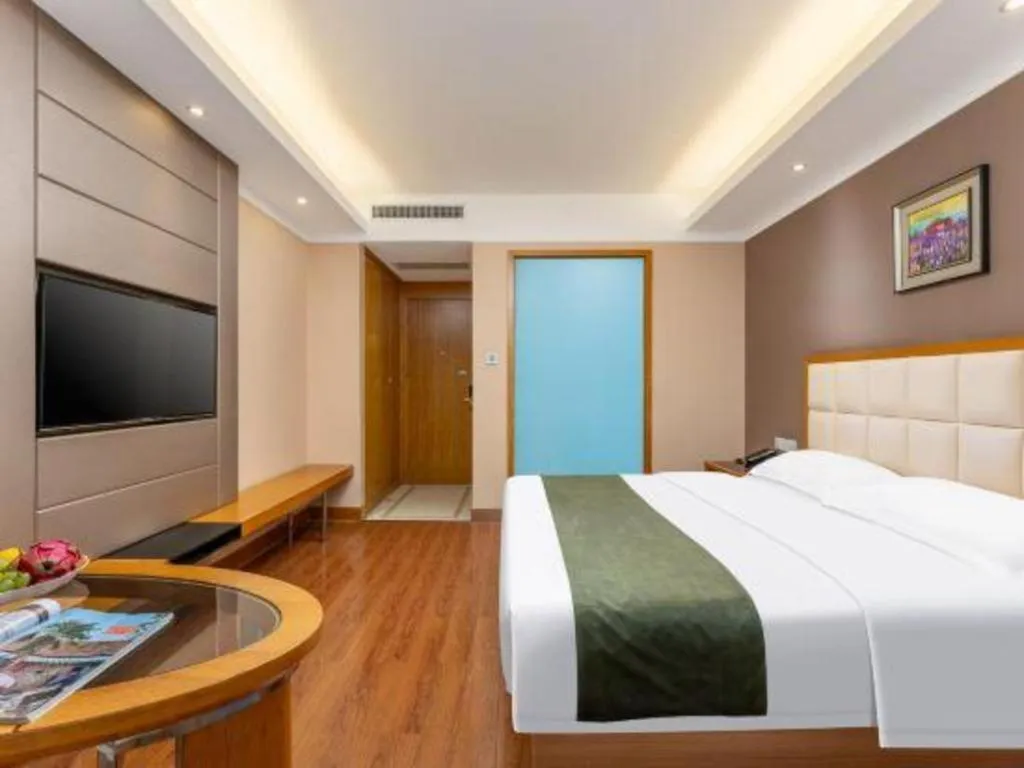 Bed in GreenTree Inn Shandong Taian Feicheng Xincheng Road Business Hotel