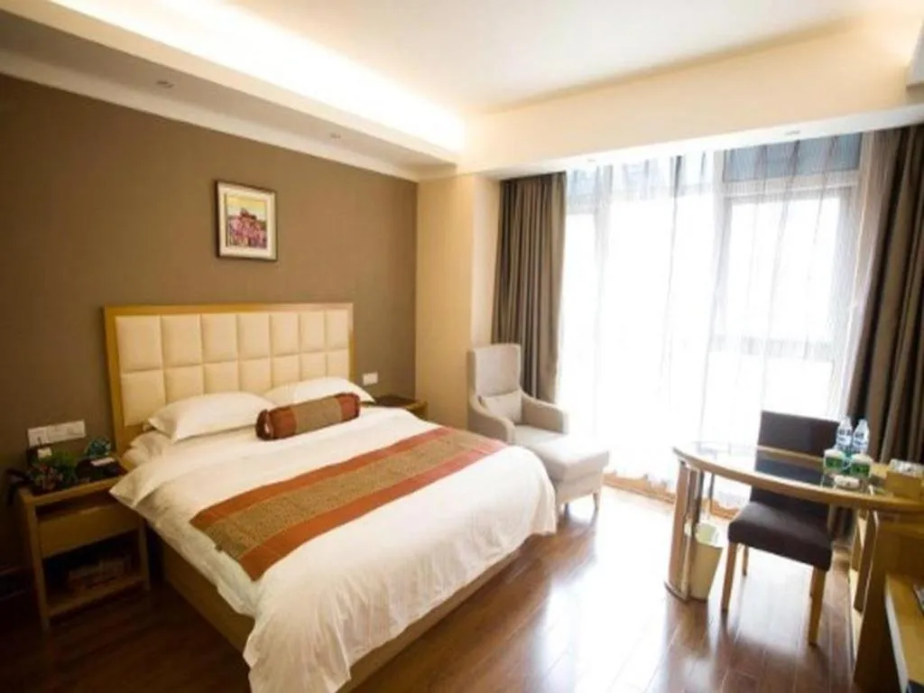 Bed in GreenTree Inn Shandong Taian Feicheng Xincheng Road Business Hotel