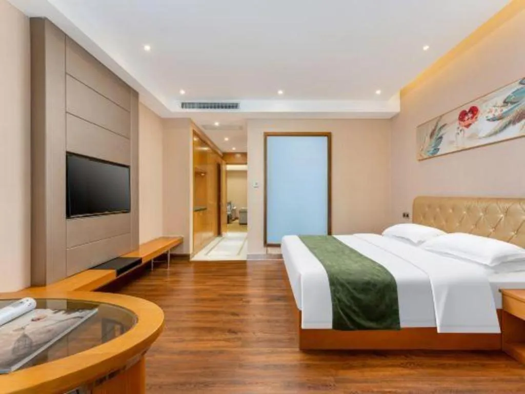 Bed in GreenTree Inn Shandong Taian Feicheng Xincheng Road Business Hotel