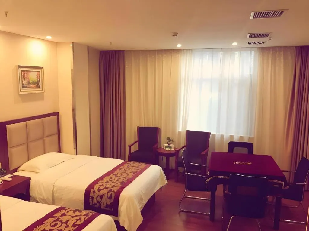 Bed in GreenTree Inn Jiangxi Shangrao Qianshan Ehu Avenue Express Hotel