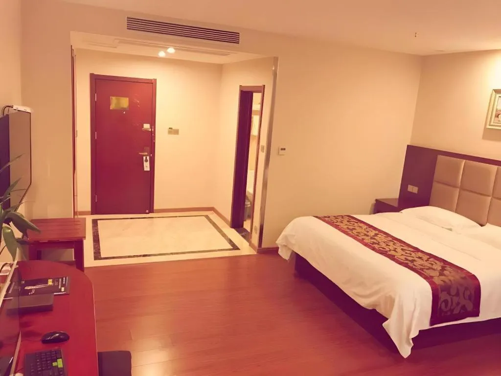 Bed in GreenTree Inn Jiangxi Shangrao Qianshan Ehu Avenue Express Hotel