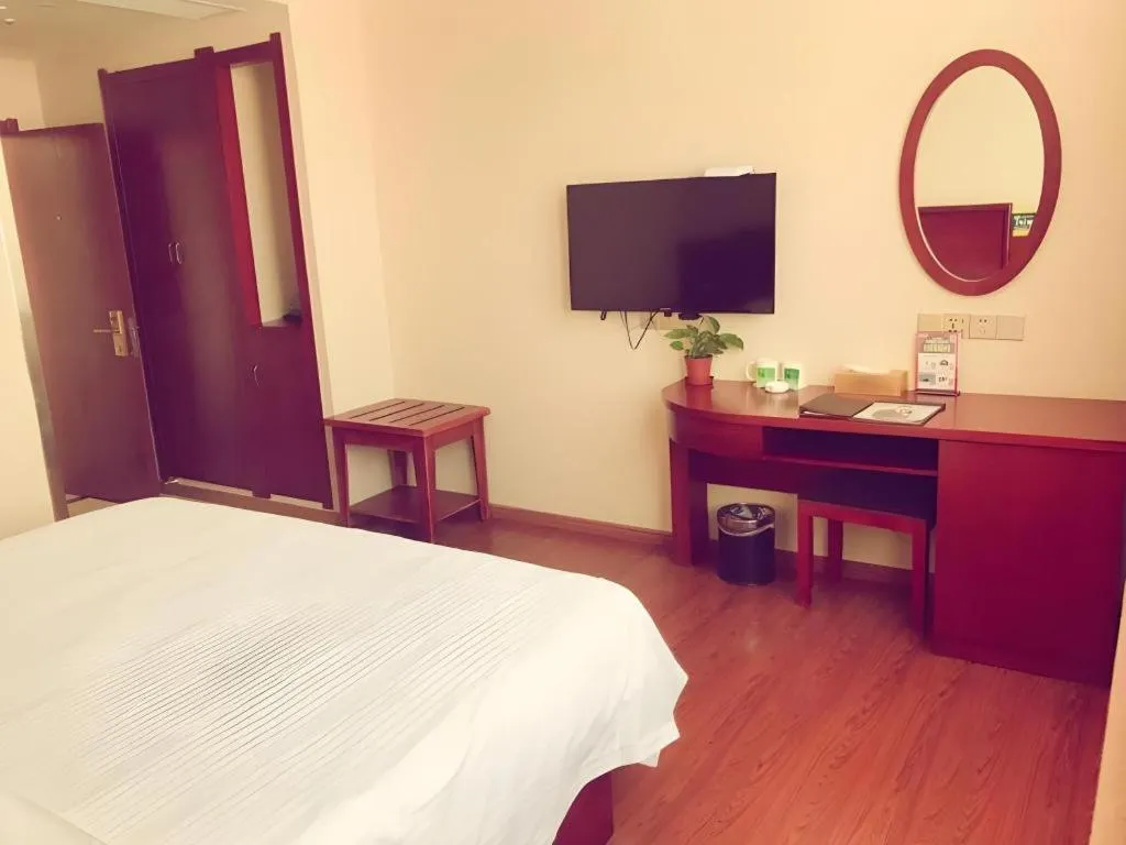 Bed in GreenTree Inn Jiangxi Shangrao Qianshan Ehu Avenue Express Hotel