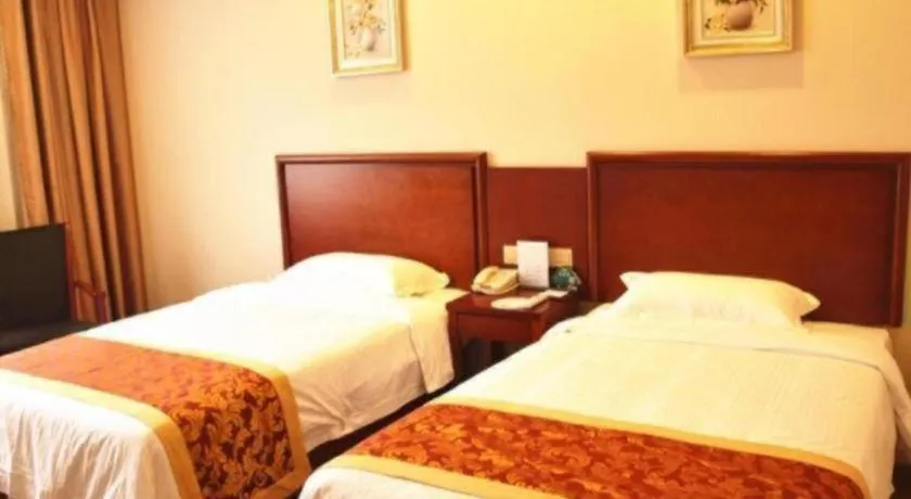 Bed in GreenTree Inn Jiangxi Shangrao Qianshan Ehu Avenue Express Hotel
