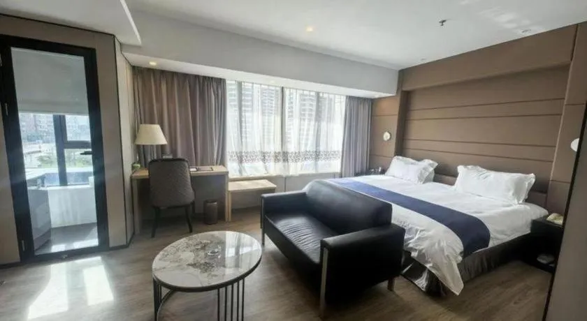 Bed in FOGER YACHT HOTEL