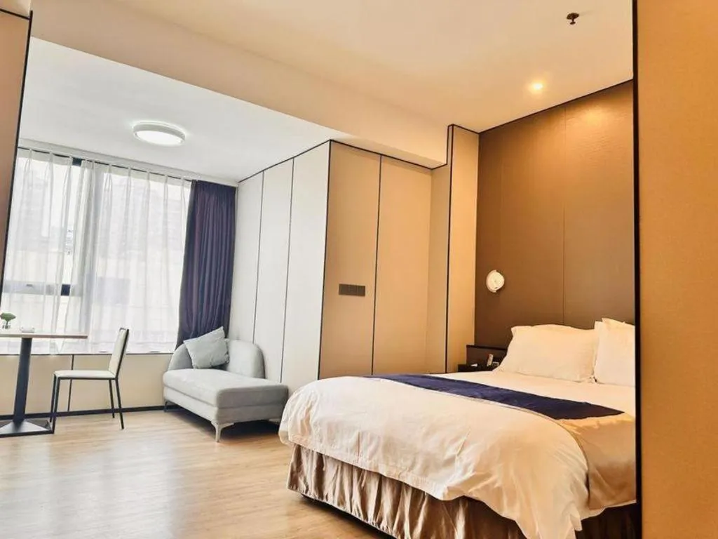 Bed in FOGER YACHT HOTEL