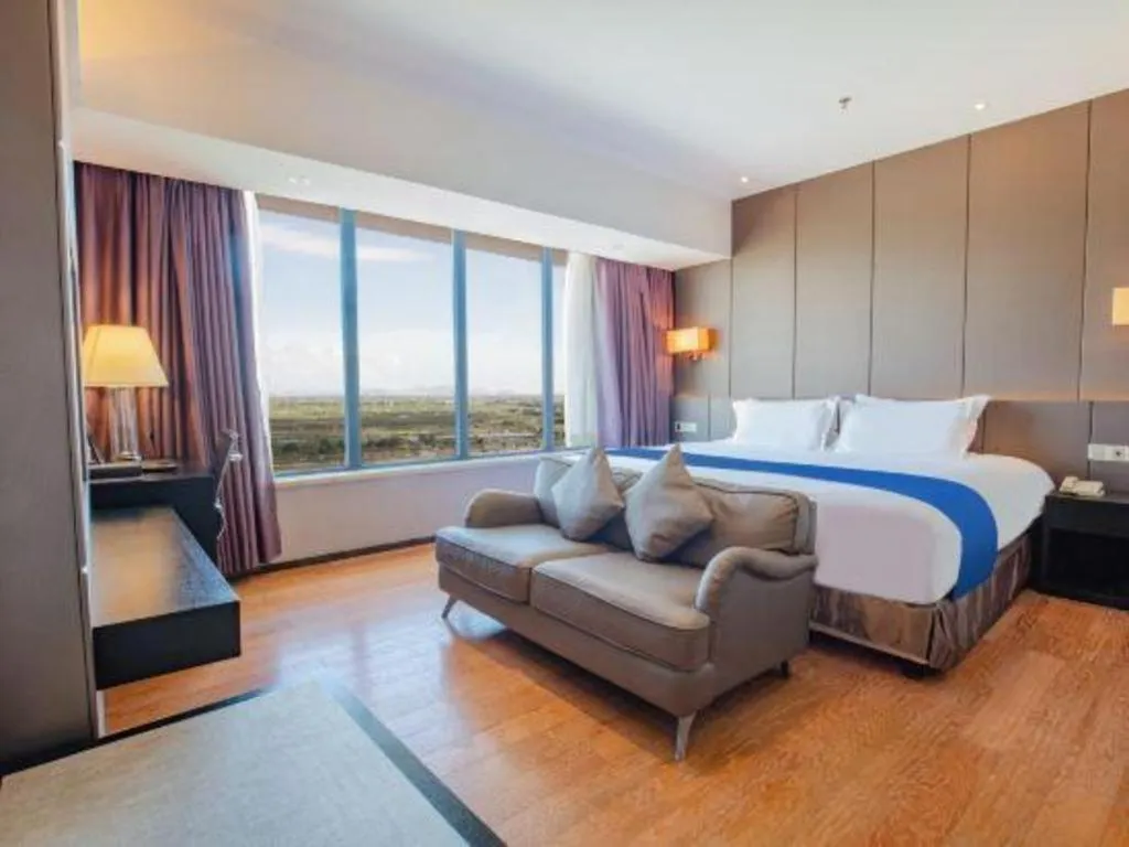 Bed in FOGER YACHT HOTEL