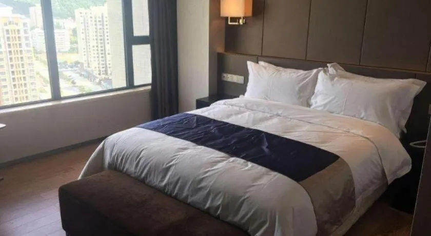 Bed in FOGER YACHT HOTEL