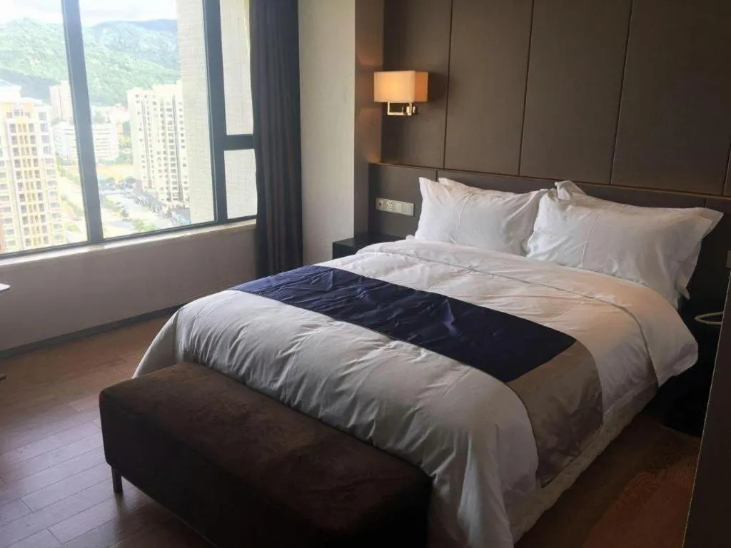 Bed in FOGER YACHT HOTEL