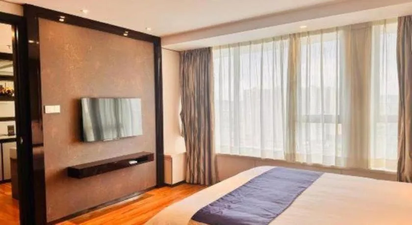 Bed in FOGER YACHT HOTEL