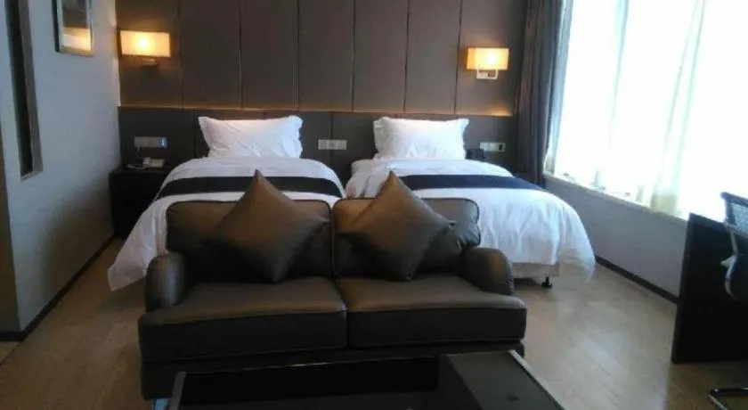 Bed in FOGER YACHT HOTEL