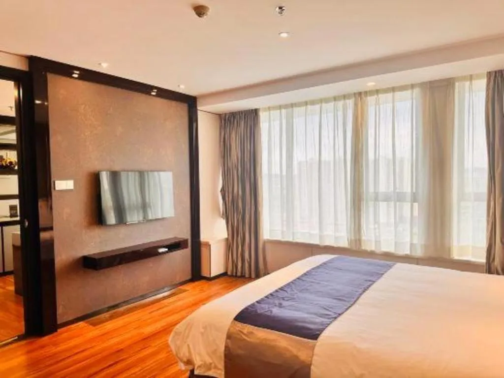 Bed in FOGER YACHT HOTEL