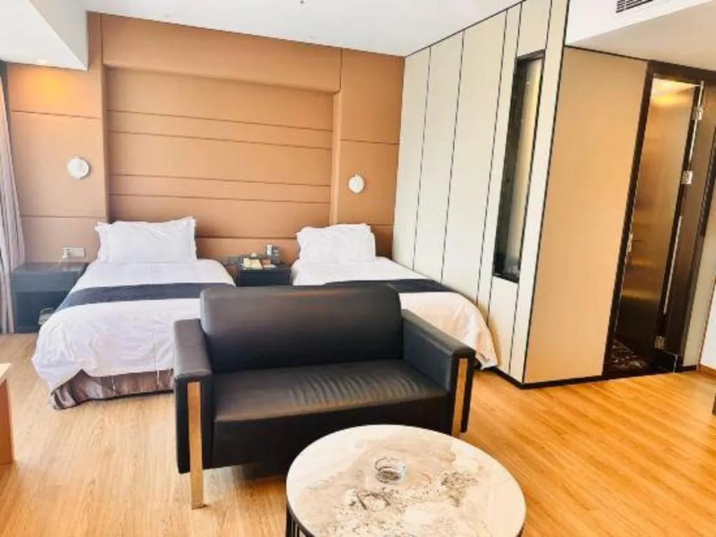 Bed in FOGER YACHT HOTEL