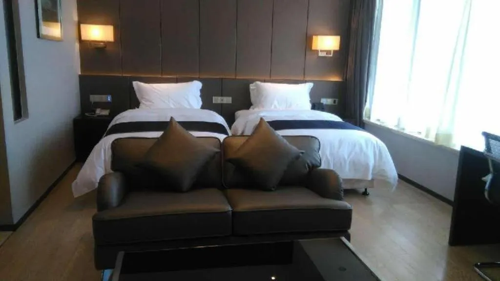 Bed in FOGER YACHT HOTEL