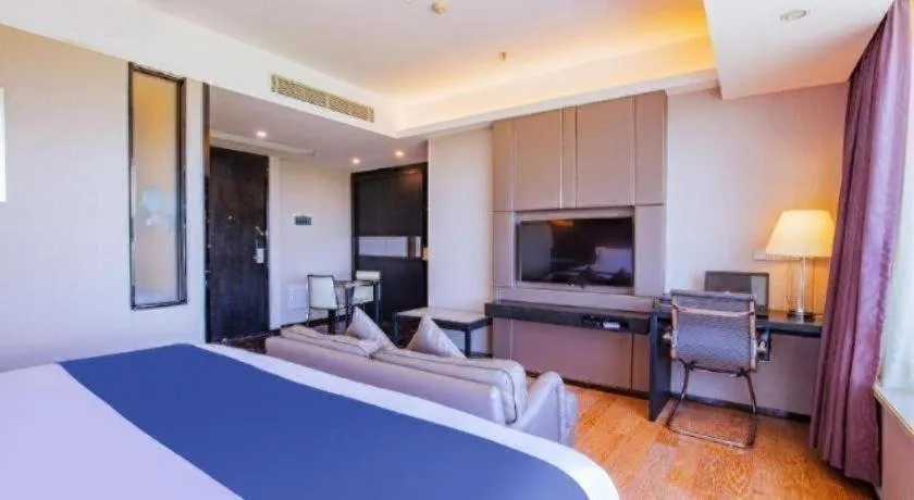 Bed in FOGER YACHT HOTEL