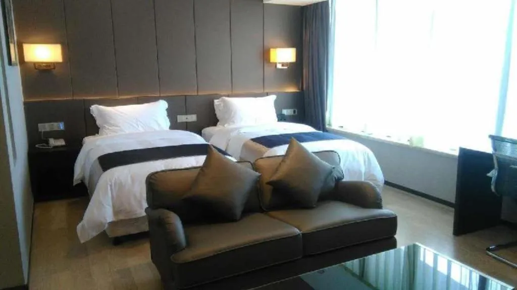 Bed in FOGER YACHT HOTEL