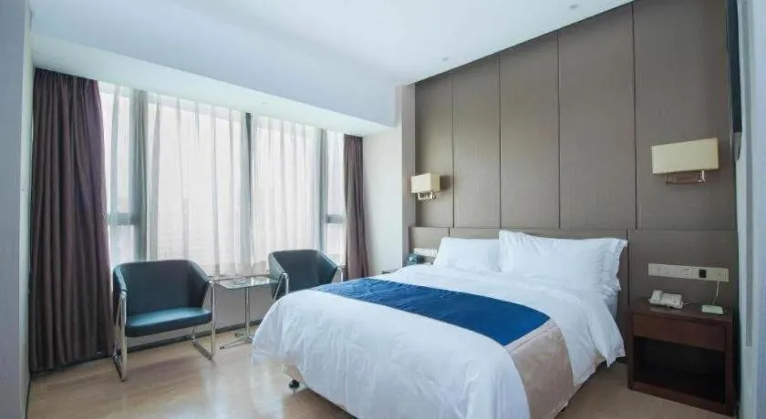 Bed in FOGER YACHT HOTEL