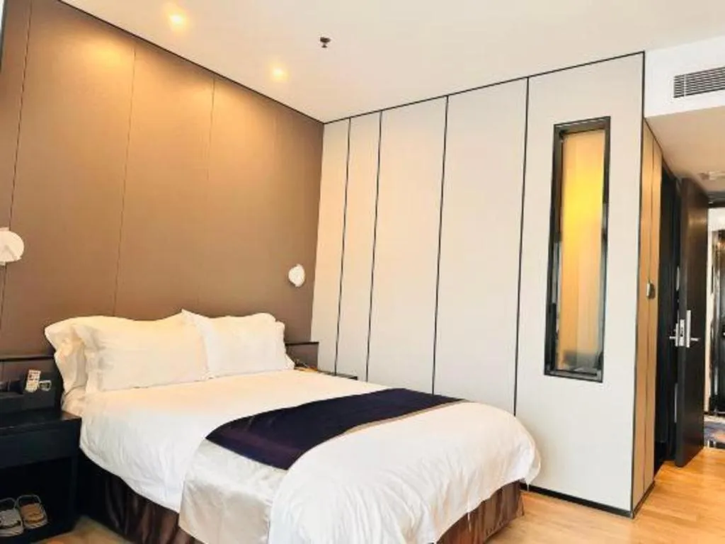 Bed in FOGER YACHT HOTEL