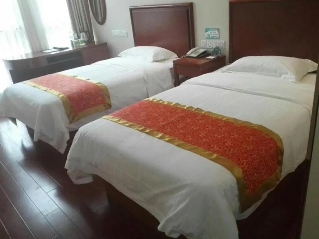 Bed in GreenTree Inn Linyi Feixian Jianshe Road Express Hotel