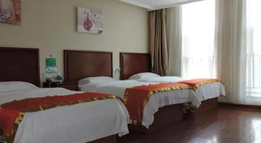 Bed in GreenTree Inn Linyi Feixian Jianshe Road Express Hotel