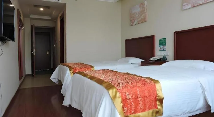 Bed in GreenTree Inn Linyi Feixian Jianshe Road Express Hotel