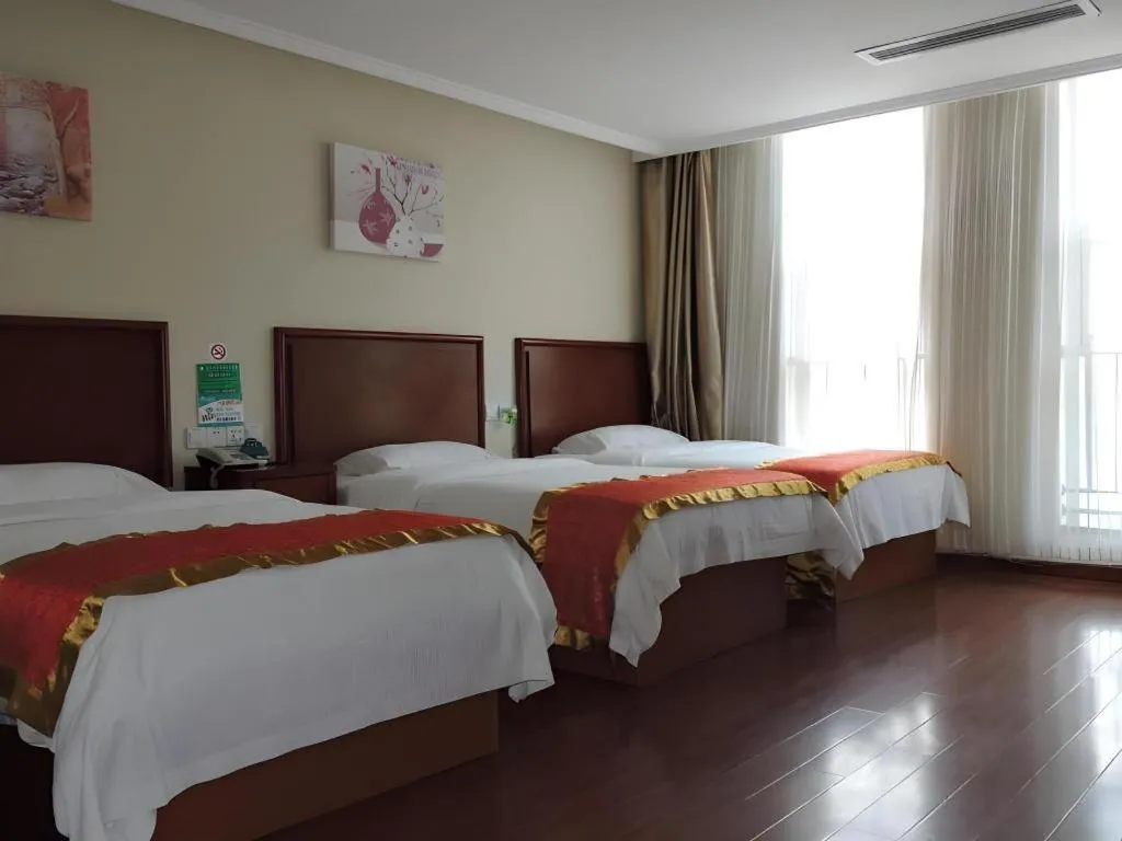 Bed in GreenTree Inn Linyi Feixian Jianshe Road Express Hotel