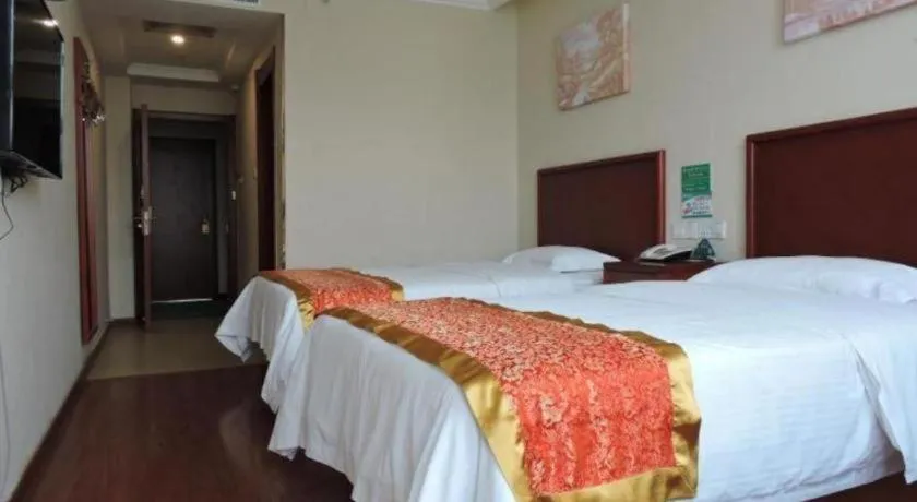 Bed in GreenTree Inn Linyi Feixian Jianshe Road Express Hotel
