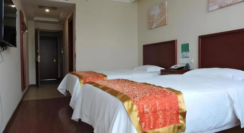 Bed in GreenTree Inn Linyi Feixian Jianshe Road Express Hotel