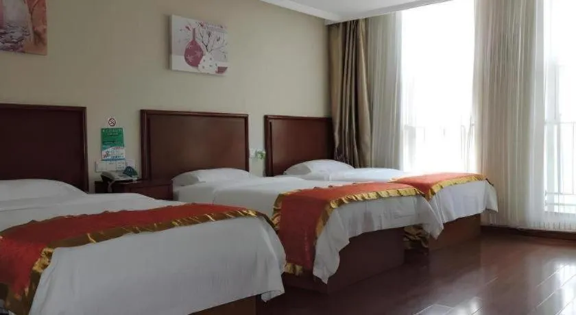 Bed in GreenTree Inn Linyi Feixian Jianshe Road Express Hotel