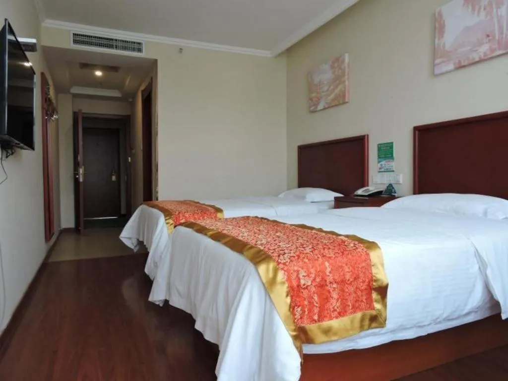 Bed in GreenTree Inn Linyi Feixian Jianshe Road Express Hotel