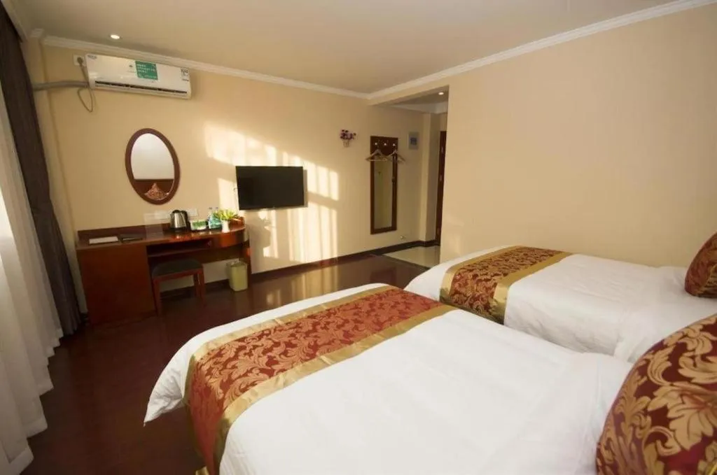 Bed in GreenTree Inn Linyi Feixian Jianshe Road Express Hotel